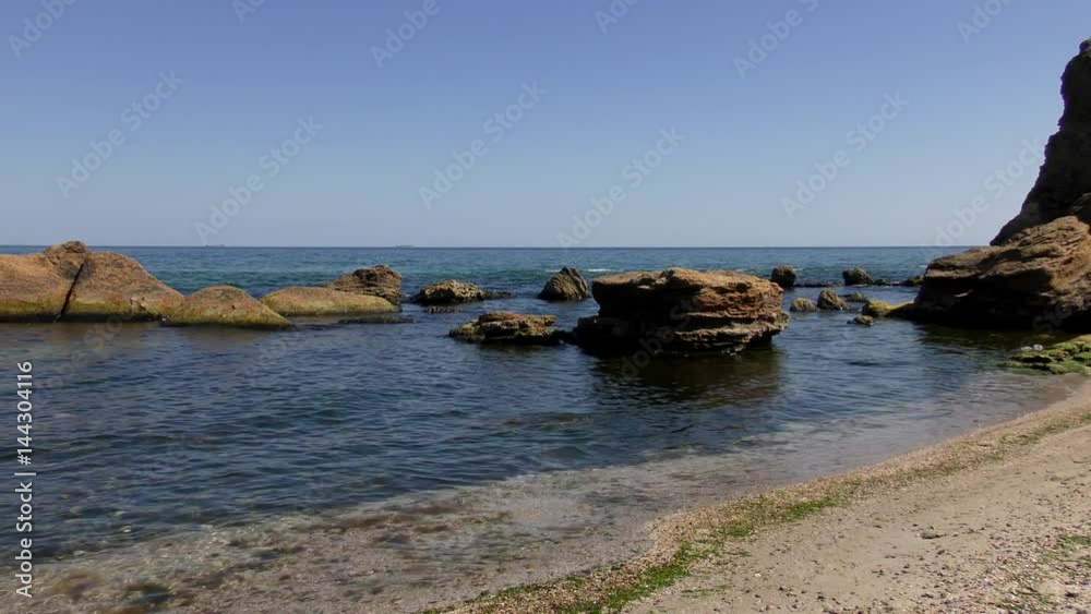Rocky beach a sunny day on the Black Sea
Rocky beach a sunny day on the Black Sea
