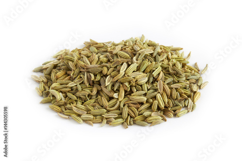 Pile of dried fennel seeds isolated on white background