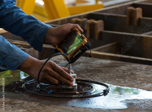 Ultrasonic test to detect imperfection or defect of steel plate in Workshop, NDT Inspection.