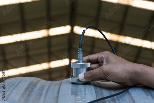 Ultrasonic test to detect imperfection or defect of wall thickness steel plate in Workshop, NDT Inspection.