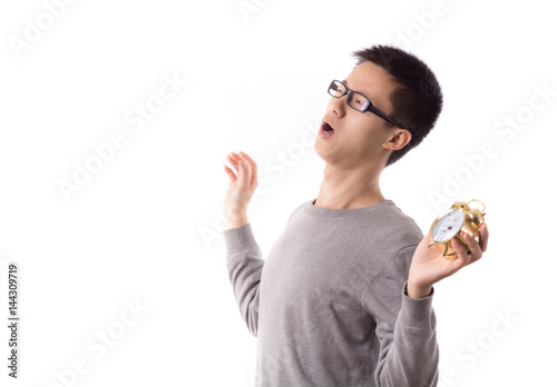 Yelling man with alarm clock in hand photo