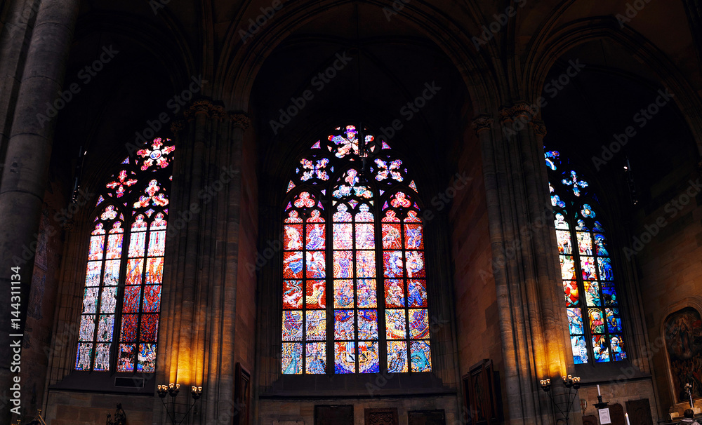 Mosaic drawings of Czech artists on the stained glass windows of St. Vitus Cathedral