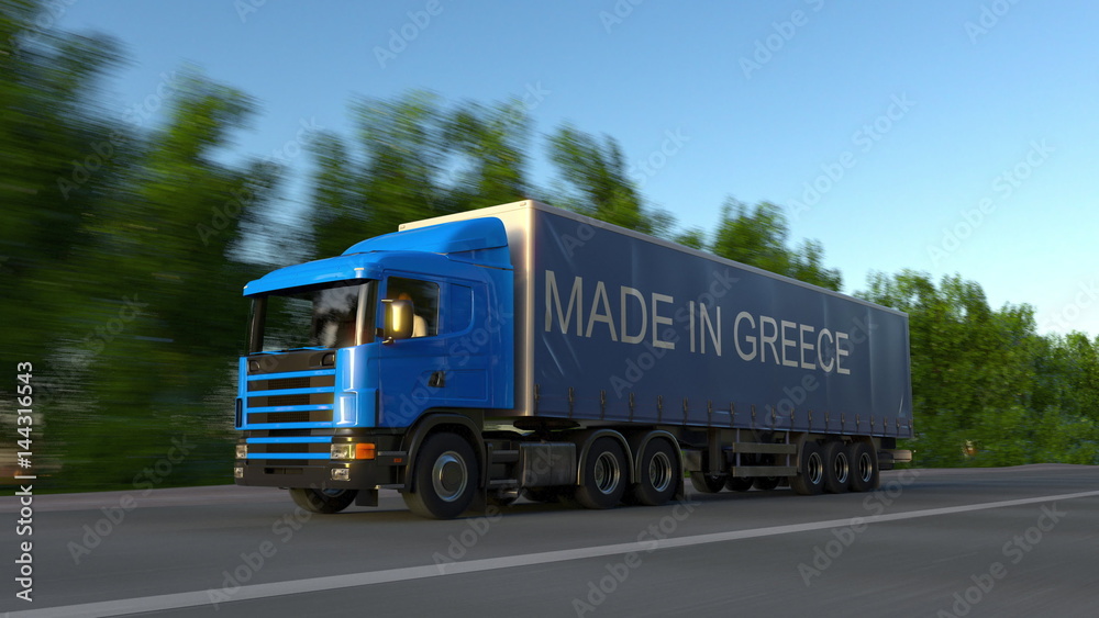 Speeding freight semi truck with MADE IN GREECE caption on the trailer. Road cargo transportation. 3D rendering