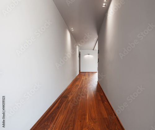 Corridor in a modern house, empty white walls
