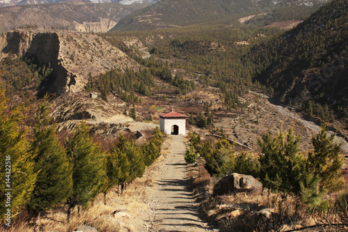 Gate to buddhist monastery  near Jomsom village, Annapurna Conservation Area, Himalaya Mountains, Nepal photo
