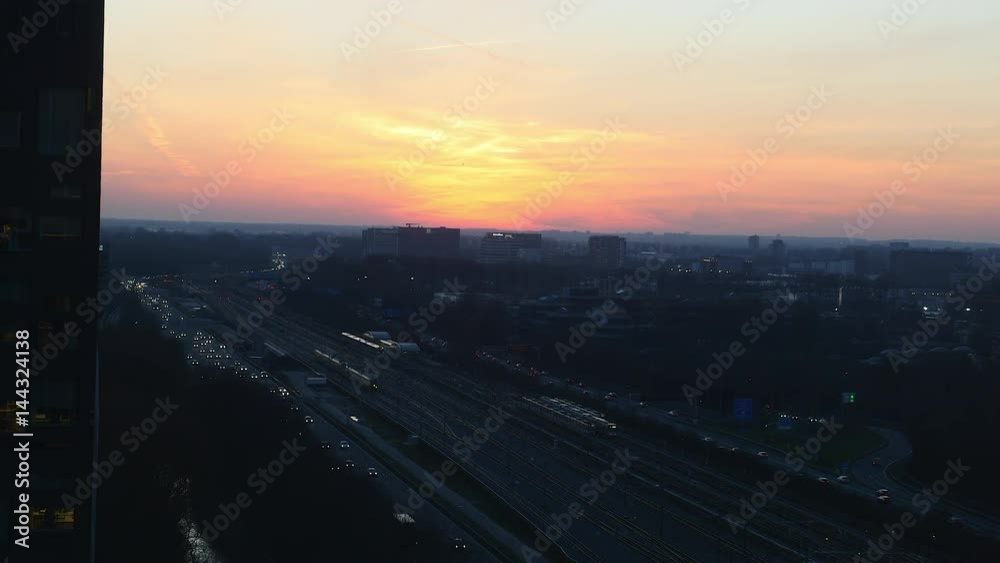 Evening traffic around Amsterdam, top view from high rise building. Evening traffic around Amsterdam, top view from high rise building.