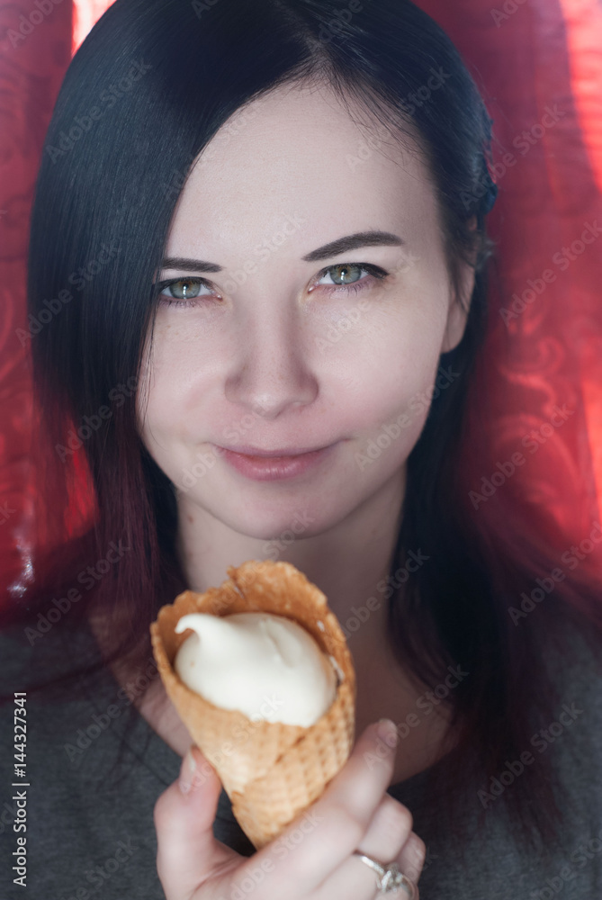 Closeup portrait of young girl eating ice cream Closeup portrait of young girl eating ice cream