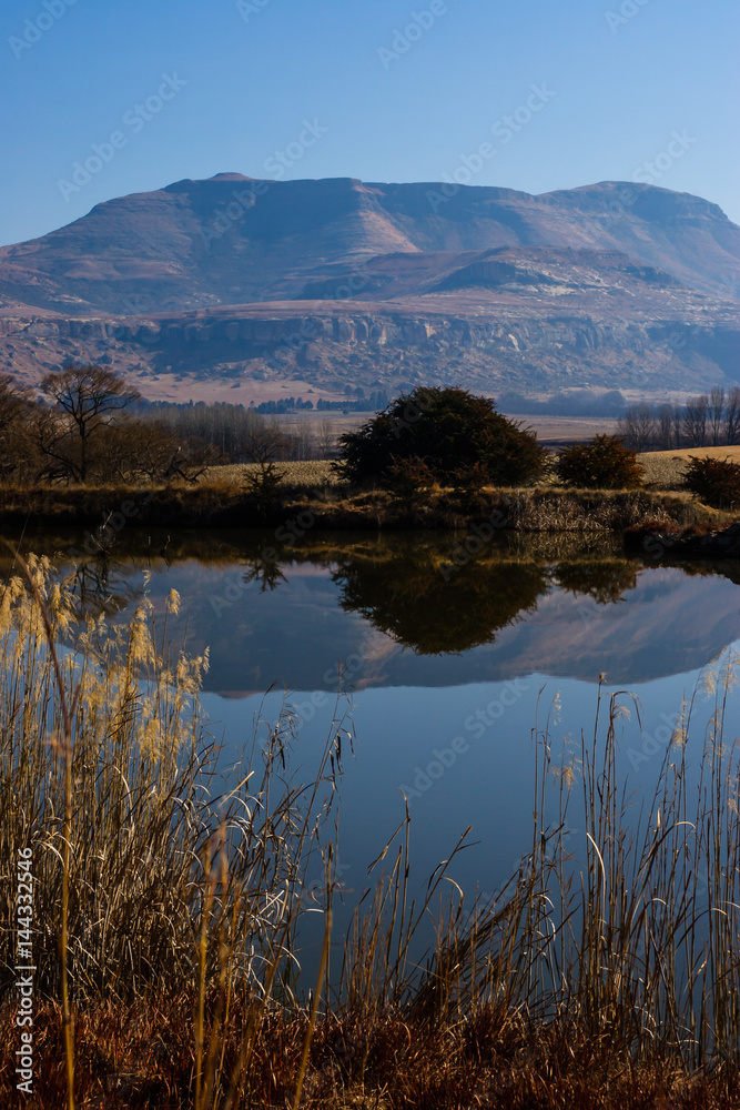 Still water with reflections of the hills, Free state, South Africa.