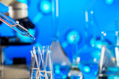 Science Concept. microscope with lab glassware, laboratory research and development 
