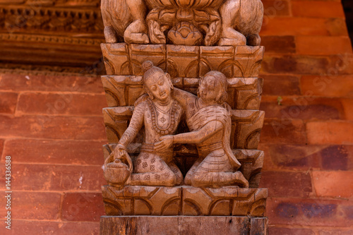 Obraz na plátně woodcraved pillers of Kamasutras in Temples in Nepal, the art of sensual relatio