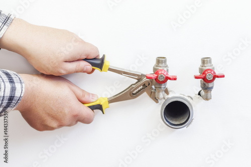 Plumber fix screws near stopcocks
