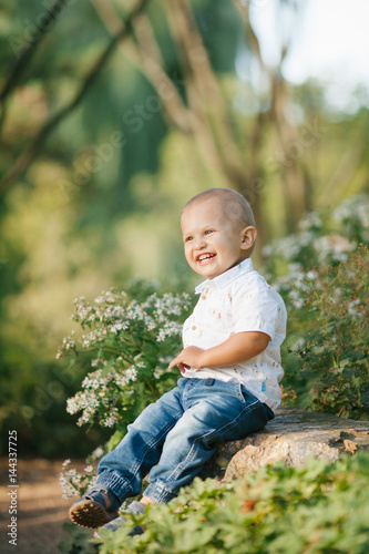 Happy little boy outside
