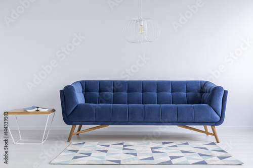 Comfortable blue couch photo