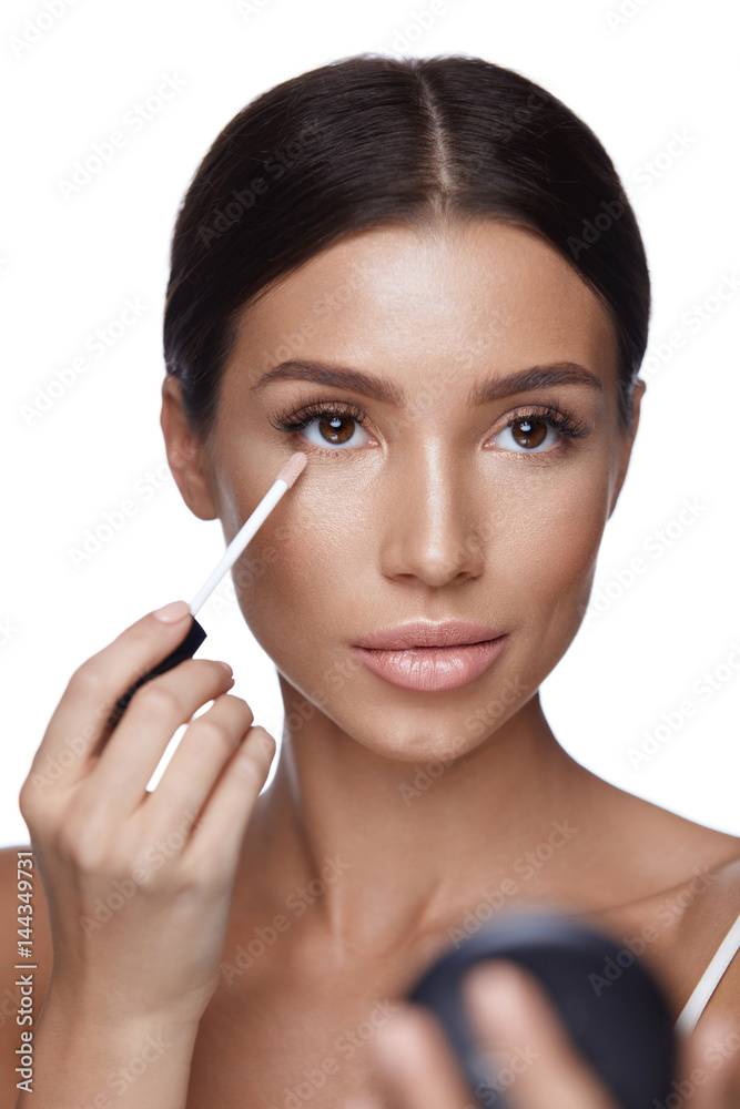 Beauty Face. Beautiful Female Applying Concealer Under Eyes Beauty Face. Beautiful Female Applying Concealer Under Eyes