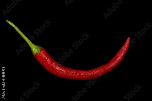 red hot chili pepper isolated on black