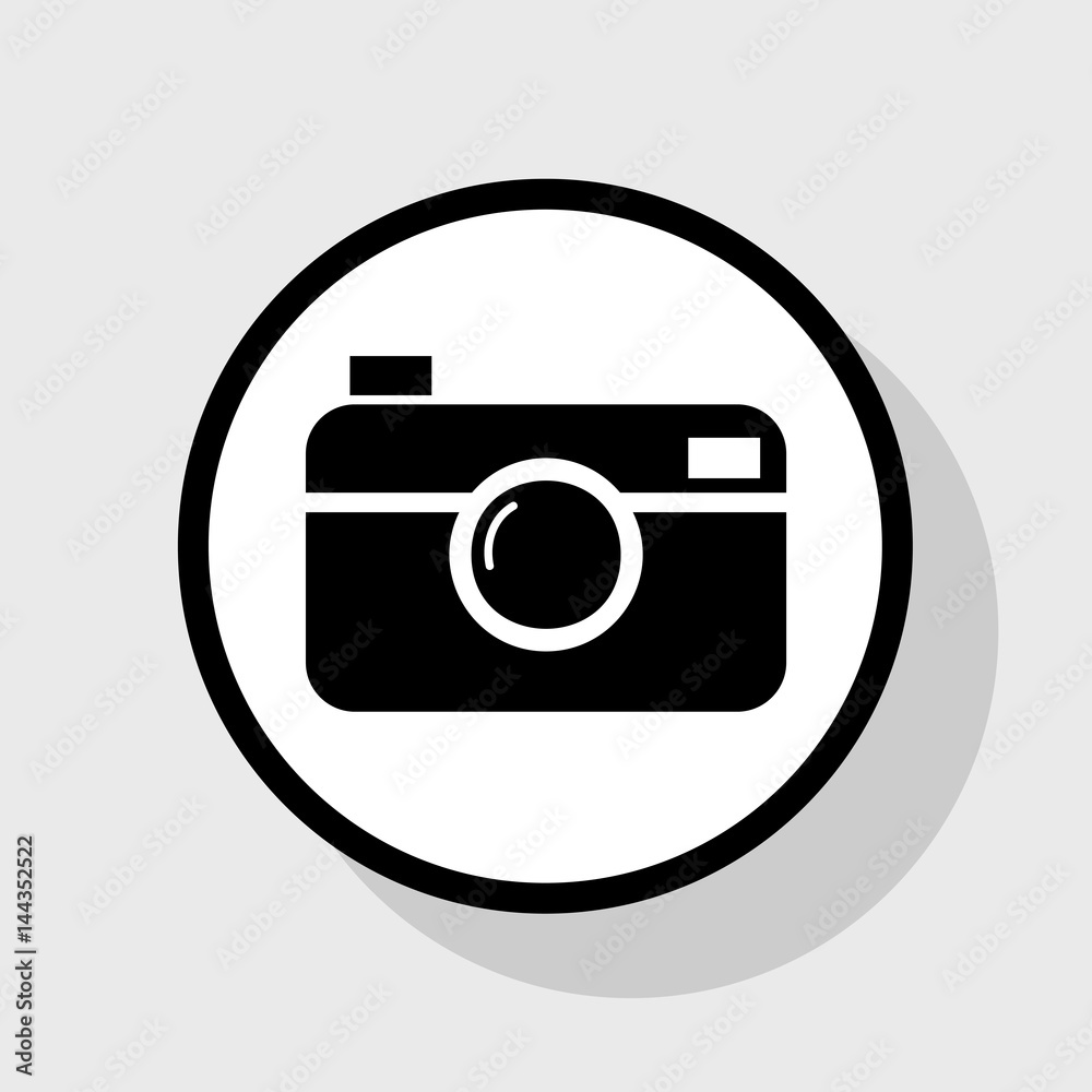 Digital photo camera sign. Vector. Flat black icon in white circle with shadow at gray background. Digital photo camera sign. Vector. Flat black icon in white circle with shadow at gray background.