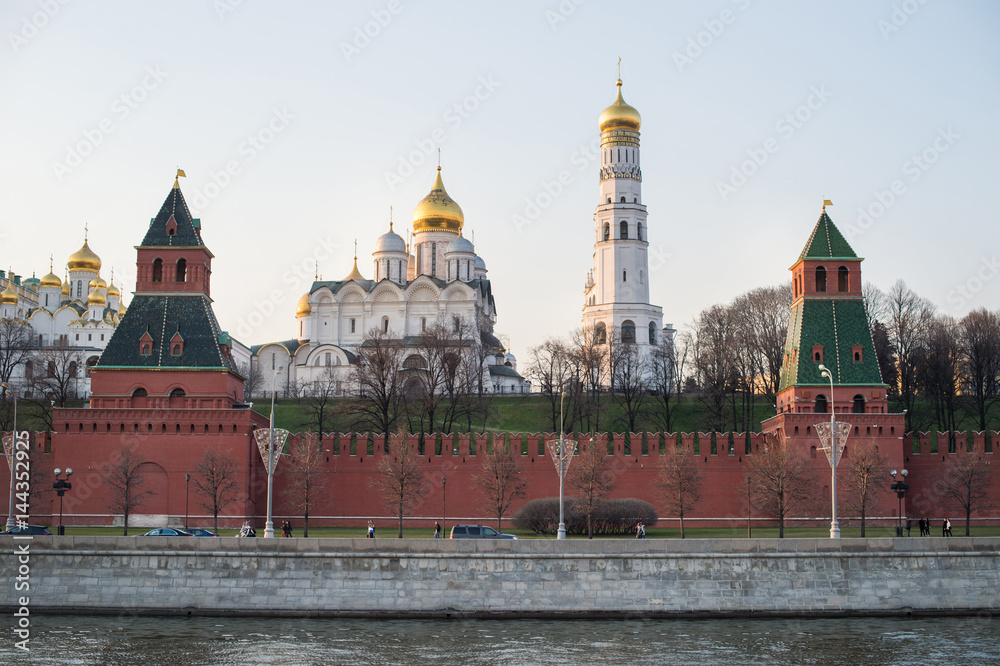 Apr 17, 2015 - Moscow, Russia : Kremlin Palace in the evening with tourist in foreground