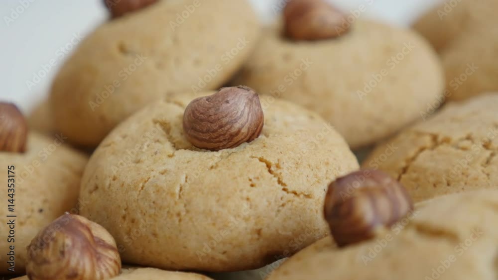Panning over tasty home made cookies on pile 4K 2160p 30fps UltraHD footage - Slow pan stacked biscuits with hazelnut close-up 3840X2160 UHD video Panning over tasty home made cookies on pile 4K 2160p 30fps UltraHD footage - Slow pan stacked biscuits with hazelnut close-up 3840X2160 UHD video
