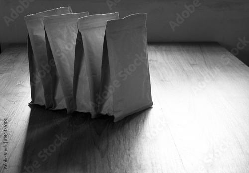 Paper bags on wooden table