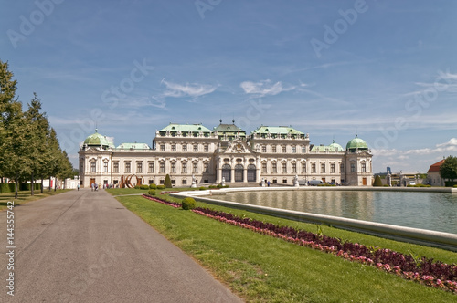 A path at the pond with the palace in the background. © MiroslawKopec