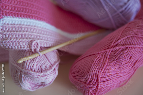 Cotton yarn in pink hues for baby girl blankets or crocheting or knitting photo