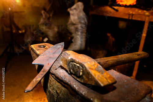 Forge, anvil, knife making.