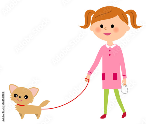 犬の散歩をする女の子