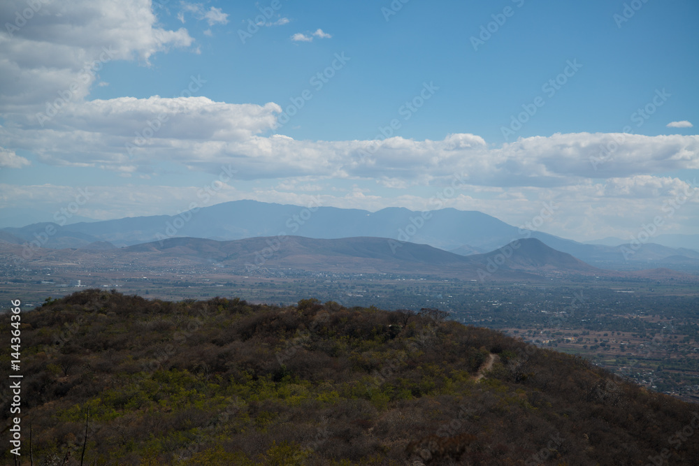 Monte Alban is a large pre-Columbian archaeological site in Oaxaca, Mexico Monte Alban is a large pre-Columbian archaeological site in Oaxaca, Mexico