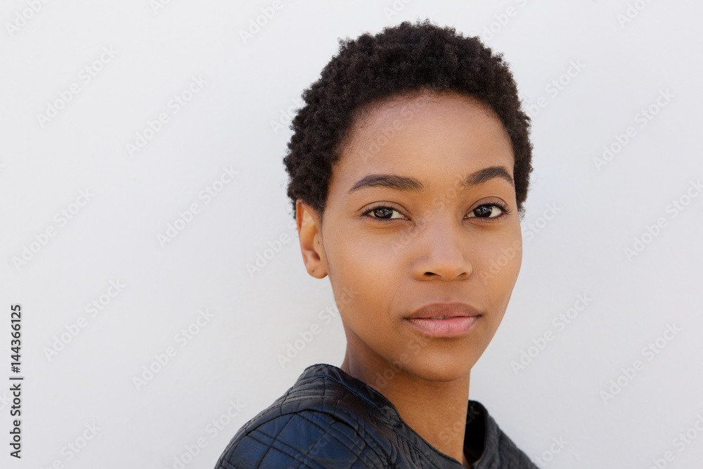 beautiful young african woman against white wall beautiful young african woman against white wall