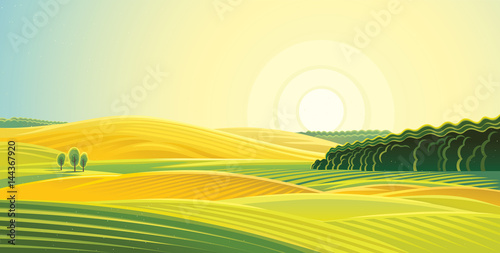Rural landscape. Fields and hills at dawn.