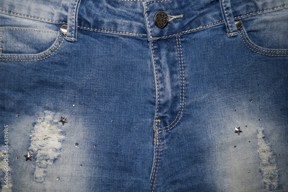 Fototapeta premium Jeans surface with rivets