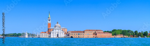 Panoramic view of the San Giorgio Maggiore island, the church and monastery at San Giorgio Maggiore in the lagoon in Venice, Italy. © Sodel Vladyslav