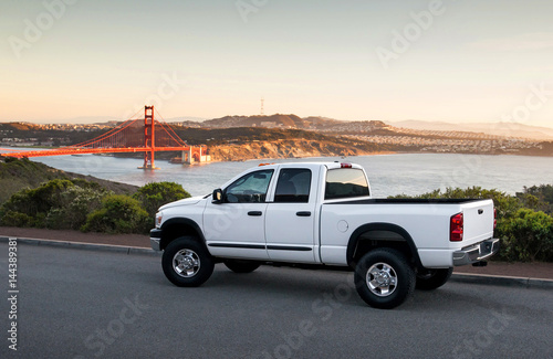 White Truck in front of the Golden Gate Bridge photo