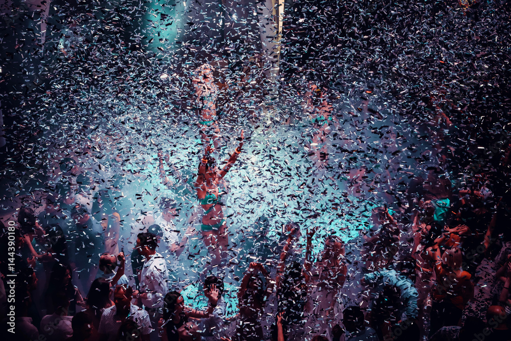 Φωτογραφία Night club dj party people enjoy of music dancing sound with colorful light with Smoke Machine and lights show