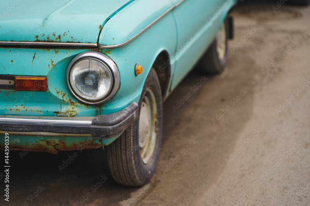 Close up of headlight lamp simply vintage green car Stock Photo | Adobe