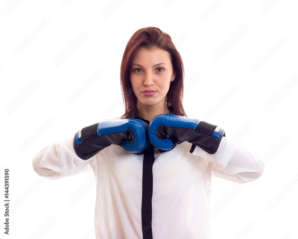 Young businesswoman in boxing gloves Young businesswoman in boxing gloves
