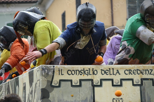 Historical battle of the oranges during Ivrea's carnival. Ivrea, Piemonte, Italy photo