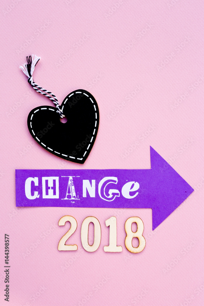Change - 2018 with purple arrow and heart shape blackboard
