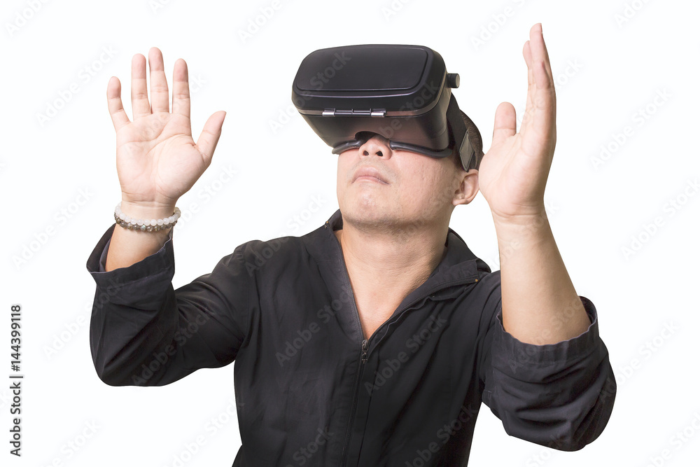 Excited man using a VR virtual reality glasses headset and experiencing virtual reality isolated background Excited man using a VR virtual reality glasses headset and experiencing virtual reality isolated background