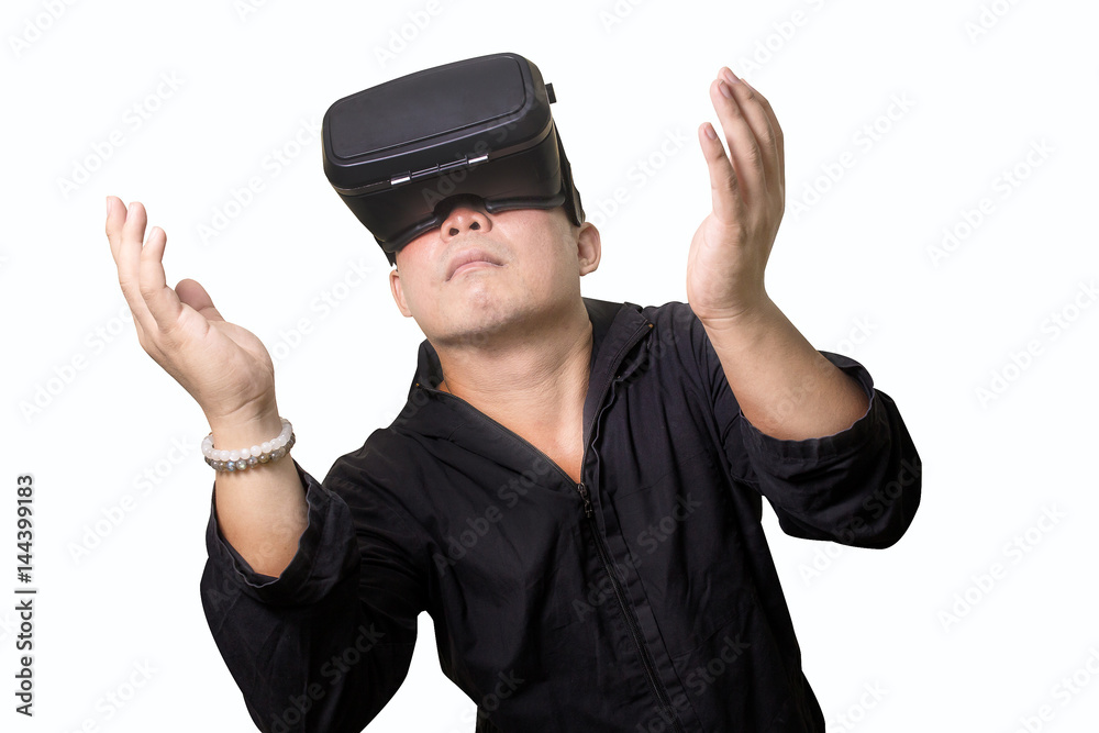 Excited man using a VR virtual reality glasses headset and experiencing virtual reality isolated background Excited man using a VR virtual reality glasses headset and experiencing virtual reality isolated background