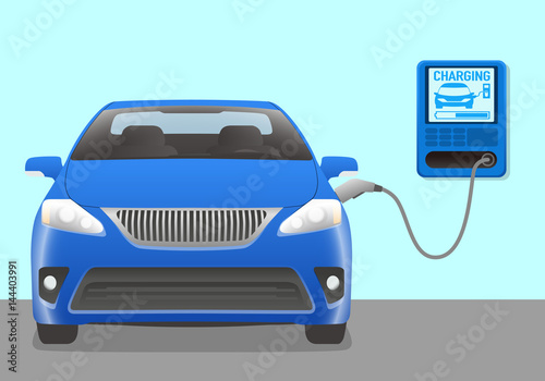 modern vehicle charging power from wallbox charging station.
