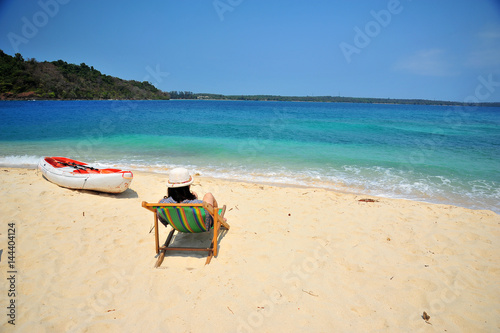 Woman Relaxing on Summer Beach 