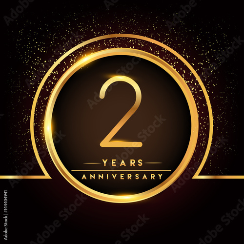 two years birthday celebration logotype. 2nd anniversary logo with confetti and golden ring isolated on black background, vector design for greeting card and invitation card.