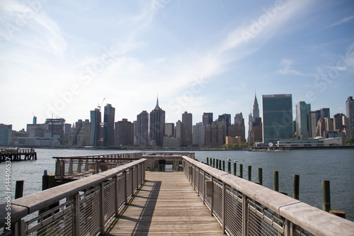 Walkway at Gantry Plaza State Park and buildings in Manhattan, New York © Spinel
