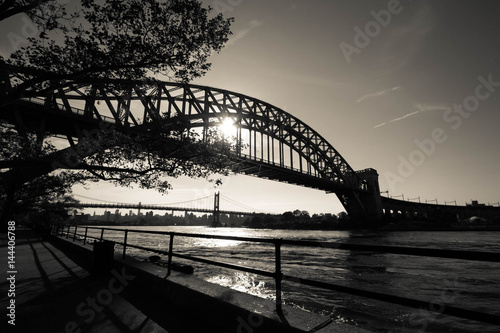 The Hell Gate Bridge and Triborough bridge over the river with walkway at Astoria park in black and white style, New York © Spinel