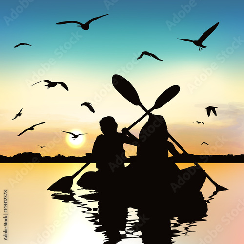 Silhouette of funny girls kayaking.