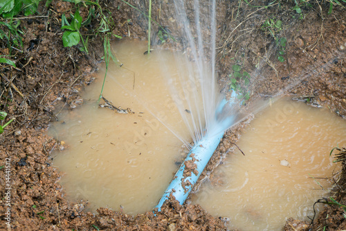 Bilde på lerret Water pipe break,  leaking from hole in a hose,selective focus