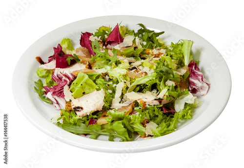 Fresh salad with chicken, lettuce, parmesan, mustard and arugula. Isolated on white background.