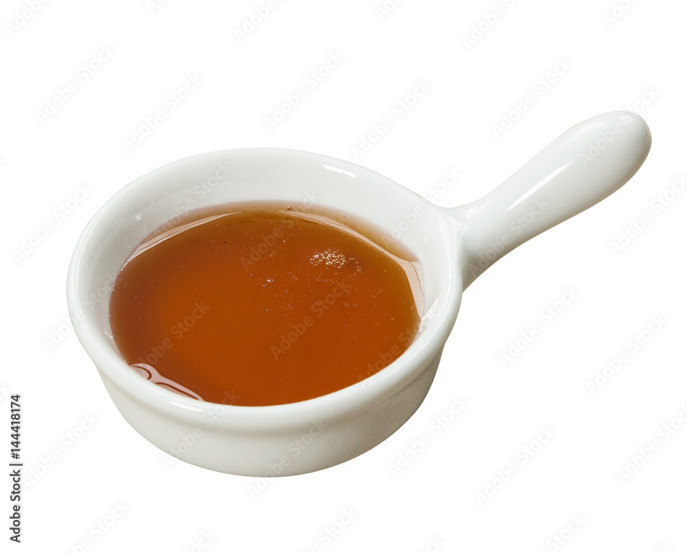 Small pot of honey. Isolated on white background Small pot of honey. Isolated on white background