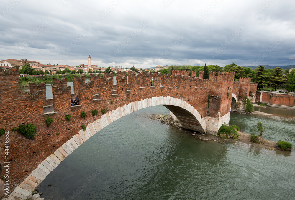 The Ponte Pietra (Stone Bridge), once known as the Pons Marmoreus, is a Roman arch bridge crossing the Adige River in Verona, Italy. The bridge was completed in 100 BC,